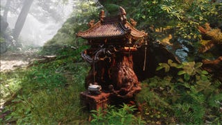 A close-up of a Keeper's Shrine in the middle of a woodland area in Chapter 1 of Black Myth: Wukong.